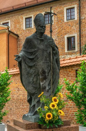 Photo for Krakow, Poland - 13 August 2022:  Statue of Pope Paul John II at Wawel Castle. - Royalty Free Image