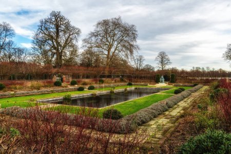 Kensington palace garden with statue of Princess Diana. London, UK