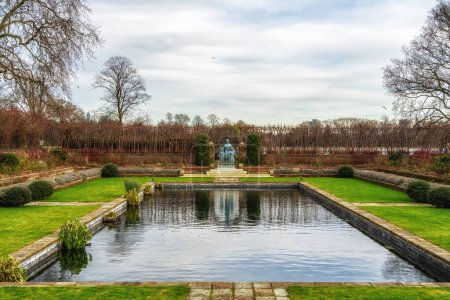 Kensington palace garden with statue of Princess Diana. London, UK