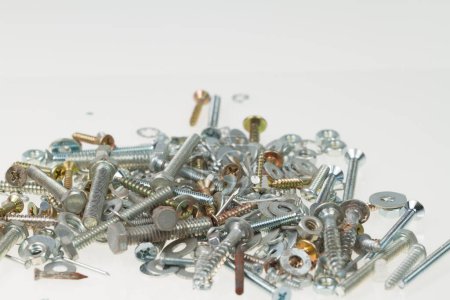 Photo for Screws, nuts, and bolts on isolated white background - Royalty Free Image