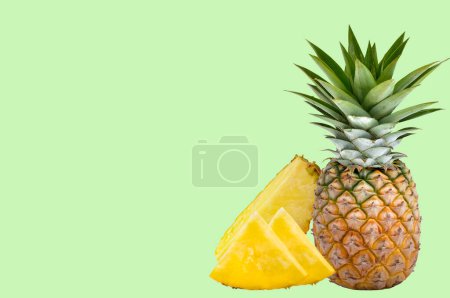 Photo for Set of ripe pineapple on the green background.fruite high Vitamiv C. - Royalty Free Image