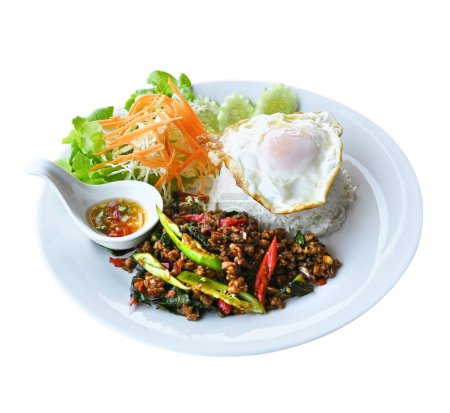 Minced pork with basil and fried egg on transparent.