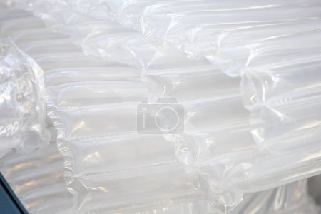 Inflatable polyethylene packaging bags with air chambers used to protect goods from damage during transportation. Packaging materials to protect fragile items.