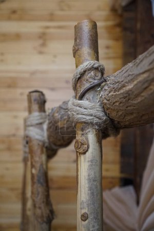 Wooden supports and ropes connecting them.