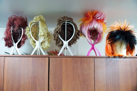 Different wigs in the dressing room  