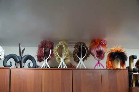 Different wigs in the dressing room  