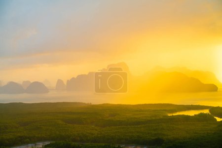 Foto de Mountain sunrise on mangrove forest sea bay sky cloud sightseeing travel in Phangnga Thailand - Imagen libre de derechos