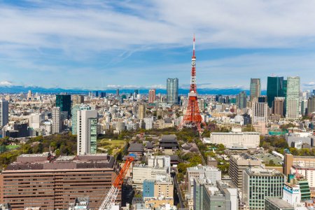 Photo for Tokyo tower and modern buildings with sunny blue sky day, Japan - Royalty Free Image
