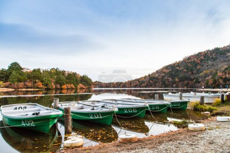 Photo for Boats at the pier of the Nikko park at autumn, Japan - Royalty Free Image