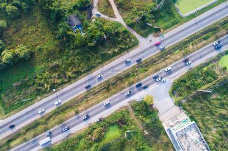 Photo for Bird eye view of transport car on the road with tree rural road of Thailand - Royalty Free Image