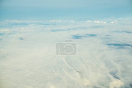 Photo for Aerial cloud fog sky with sunride light blue sky background view from airplan - Royalty Free Image