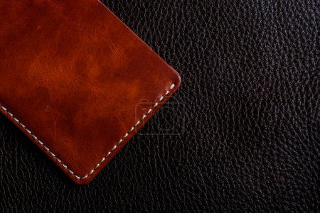 Photo for Brown genuine vegetable tanned leather on cowhide background, Craftsmanship object - Royalty Free Image