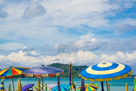 Photo for Sea beach with umbrella and people summer relax, Phuket Thailand - Royalty Free Image