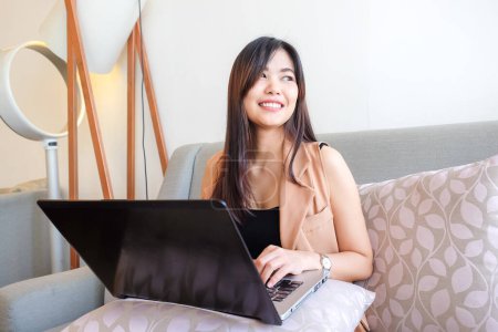 Photo for Business asian women using laptop computer in modern cafe - Royalty Free Image