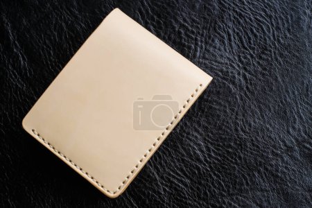 Photo for Genuine leather wallet craftsmanship handmade, Cowhide product - Royalty Free Image