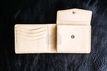 Photo for Genuine leather wallet craftsmanship handmade, Cowhide product - Royalty Free Image