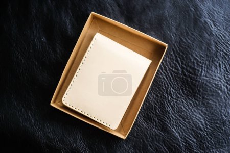 Photo for Handmade leather wallet vegetable tanned leather top view - Royalty Free Image