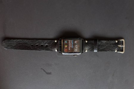 Photo for Fashion smart watch with leather strap craftsmanship workshop - Royalty Free Image
