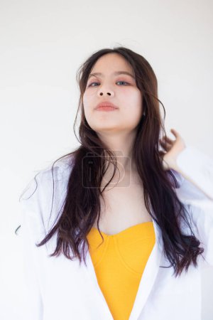 Photo for Portrait of beautiful young asian pretty woman white collar shirt on white background in studio - Royalty Free Image