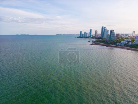Photo for Aerial view Pattaya city buildings sea beach with boats morning sunrise travel city sightseeing in Thailand - Royalty Free Image
