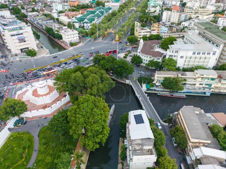 Photo for Riverside old town village with modern office building in Bangkok Thailand Aerial view - Royalty Free Image