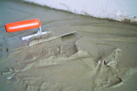 Photo for Cement plastering interior renovate working with equipment new house building industry - Royalty Free Image