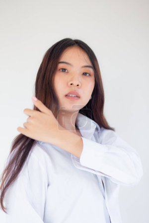 Foto de Hermosa asiático largo cabello 20s mujer retrato en blanco fondo hermosa mujer de negocios - Imagen libre de derechos