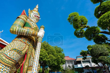 Photo for Gates to Ordination Hall with statues of Giants, demon guardians at Wat Arun. Famous temple in Bangkok, Thailand. - Royalty Free Image