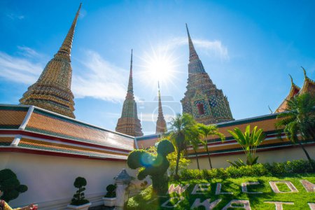 Photo for Buddhist pagoda temple sunshine day blue sky in Bangkok, Thailand - Royalty Free Image