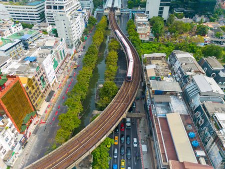 Photo for Aerial view BTS sky train city transport with modern hi rise office building Silom and Satorn district Bangkok Thailand - Royalty Free Image