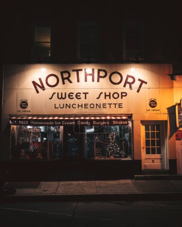 Photo for Northport Sweet Shop vintage sign at night, Northport, New York - Royalty Free Image
