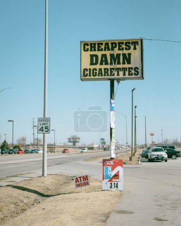 Photo for Cheapest Damn Cigarettes sign, Lincoln, Nebraska - Royalty Free Image