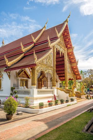 View at the Wat Phra Singh Woramahawihan in the streets of Chiang Mai in Thailand