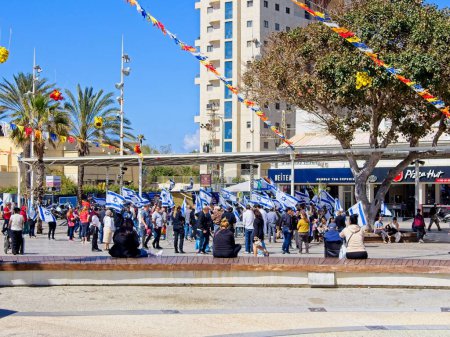 Photo for Netanya, Israel - March 9, 2023. Protesters demonstrate on Israel streets against judicial reform pushed by Netanyahu government - Royalty Free Image