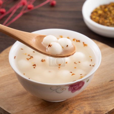 Photo for Little sweet osmanthus soup white tangyuan with decoration with fu word means good fortune. - Royalty Free Image