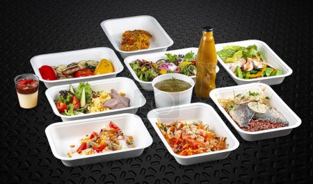 Photo for A variety of healthy and delicious meal options in eco-friendly takeaway containers. - Royalty Free Image