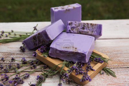 Lavender soap on a vintage wooden board.