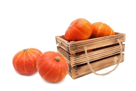 Photo for Wooden vintage box with fresh organic ripe pumpkins isolated on a white background. - Royalty Free Image