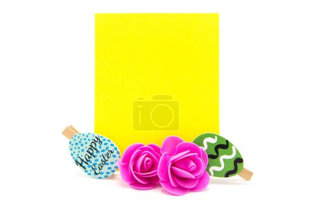 Greeting blank card, clothespins with colored eggs and flowers. Copy space. Free space for text. Happy easter!