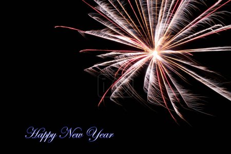 Téléchargez les photos : Real fireworks photography and abstract colorful fireworks background with Happy New Year lettering - en image libre de droit