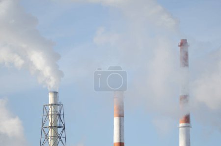 Photo for Chimneys of a pulp and paper industry. Nippon Paper Industries. Kushiro. Hokkaido. Japan. - Royalty Free Image