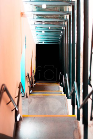 Photo for Empty staircase going in to the darkness, scary background - Royalty Free Image