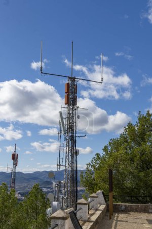 antennas installed among trees and vegetation in a natural environment