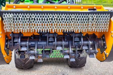 Hydraulic mulcher with fixed hammers for remote controlled vehicles.
