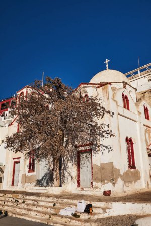 Photo for Saint John the Theologian Holy Orthodox Church - Santorini Island, Greece - Sunset, Summer, Dome, Destination - Royalty Free Image