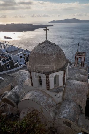 Photo for Saint John the Theologian Holy Orthodox Church - Santorini Island, Greece - Sunset, Summer, Dome, Destination - Royalty Free Image