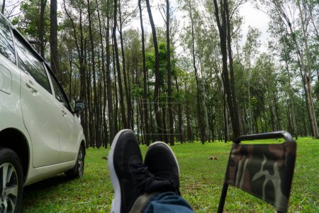 Photo for Picnic with car in pine forest at northern of Thailand, Copy space. - Royalty Free Image