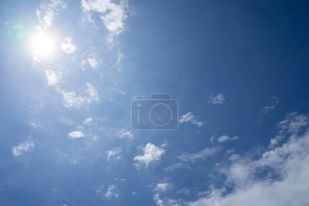 Photo for Blue sky with a sparkling ray of light from the sun and clouds Filmed in Chiang mai City ,Thailand - Royalty Free Image