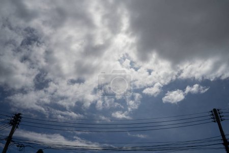 Photo for Electric tower and power line on sky and black clouds. Filmed in Chiang mai City ,Thailand - Royalty Free Image