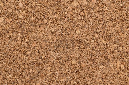Photo for Untreated cork panel, close-up of the coarse texture of rough grained cork oak, Quercus suber. Used as decorative panels and veneers for coaster, bulletin boards, floor and wall tiles. Macro photo. - Royalty Free Image